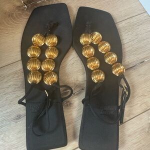 Black and gold sandals